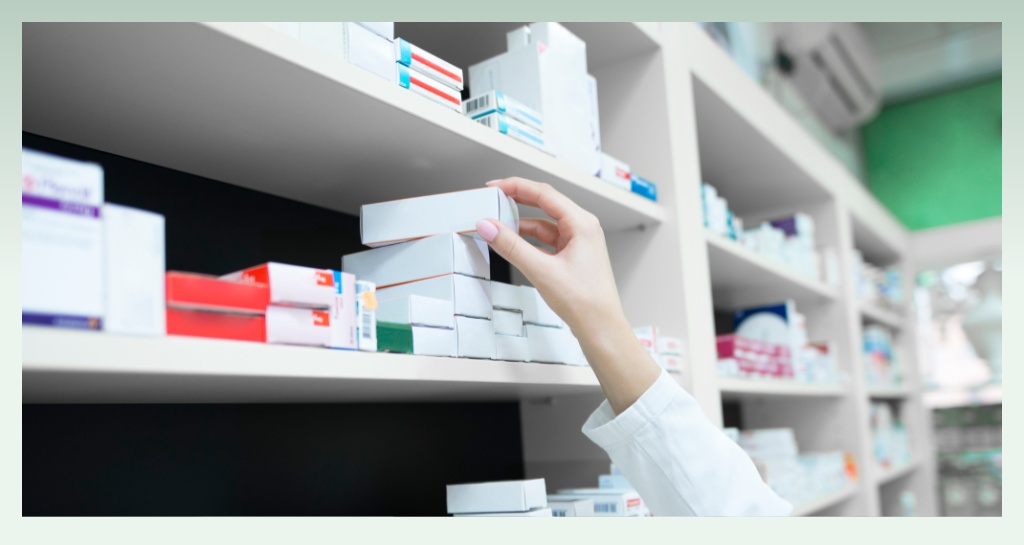 pharmacist-selecting-medicine-from-shelf-pharmacy-company-name-ideas