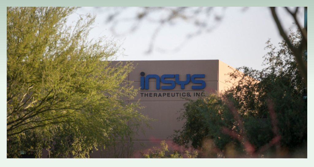 building-with-list-of-pharmacy-names-insys-therapeutics-inc-amidst-greenery
